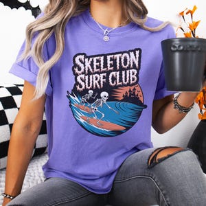 Comfort Colors® Skeleton Surf Club Shirt – Funny Halloween Beach Tee with Spooky Skeletons Surfing, Coastal Goth Shirt