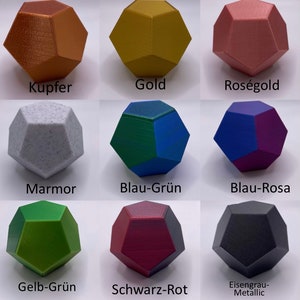 May include: Nine different colored geometric shapes, each with a unique finish. The colors include copper, gold, rose gold, marble, blue-green, blue-pink, yellow-green, black-red, and iron gray metallic.
