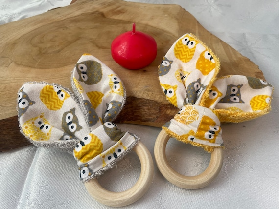 2 Teething and/or grasping rings/rattles for babies