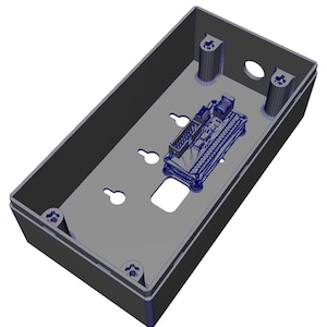 Puede incluir: Una carcasa rectangular de plástico gris oscuro con una superposición de malla de alambre. La base interior contiene cuatro postes de tornillo en las esquinas, tres ranuras de montaje, un recorte rectangular y un conector electrónico central.