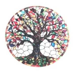 May include: Circular decorative piece featuring a tree of life design. The tree has a dark brown trunk and branches, with colorful leaves in shades of red, yellow, blue, and green. The design is set against a white background.
