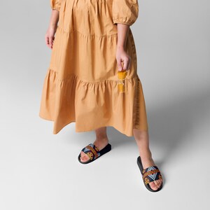 HE Toghu Women's slides