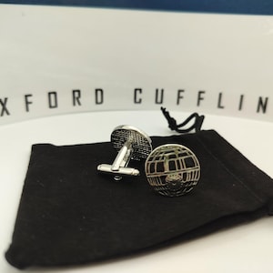 Boutons de manchette étoile de la mort Star Wars.