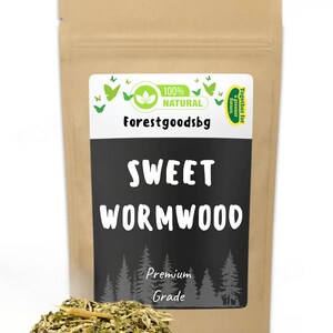 May include: A brown paper pouch containing dried sweet wormwood herbs. The label features the text Forestgoodsbg, 100% Natural, Sweet Wormwood, and Premium Grade, along with green butterfly icons and a forest silhouette graphic at the bottom.