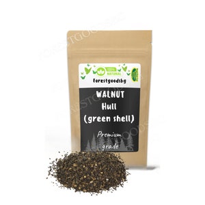 May include: A brown paper bag with a white label that says "100% NATURAL forestgoodsbg WALNUT Hull (green shell) Premium grade". The bag is filled with dried walnut hulls.