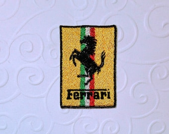 Embroidered iron-on patch, car racing, horse, Italy. 6 cm x 4 cm