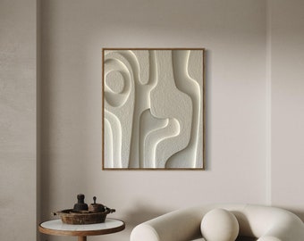 May include: A white armchair with a round back and two large, round cushions. The armchair is in a room with a beige wall and a framed abstract art print above a small wooden table with a tray of decorative objects.