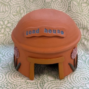 Handmade, outdoor ceramic toad house