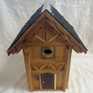 Hand made natural looking birdhouse designed to last.