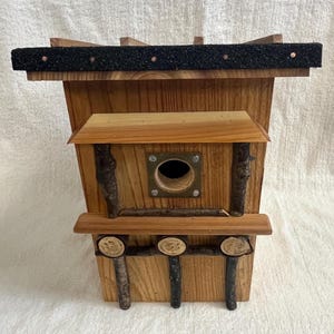 Hand made natural looking birdhouse designed to last.