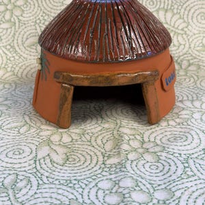 Hand made terra cotta "Tiki"  toadhouse for outdoor use