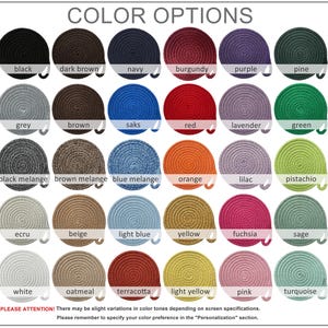 May include: A color chart displaying thirty circular coiled rope coasters in various shades including black, brown, navy, burgundy, purple, pine, grey, saks, red, lavender, green, black melange, brown melange, blue melange, orange, lilac, pistachio, ecru, beige, light blue, yellow, fuchsia, sage, white, oatmeal, terracotta, light yellow, pink, and turquoise.