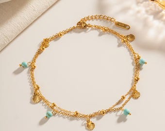 Fußkette Edelstahl 18k vergoldet mit Muschelanhänger und türkisen Perlen