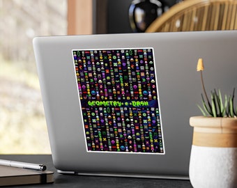 Könnte beinhalten: Ein Aufkleber mit einem bunten, pixeligen Design aus verschiedenen geometrischen Formen und Symbolen. Der Text "GEOMETRY DASH" ist in grünen Buchstaben dargestellt.