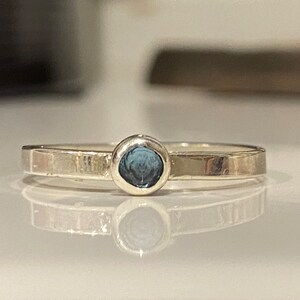 Stirling Silver band with Sky Blue Topaz