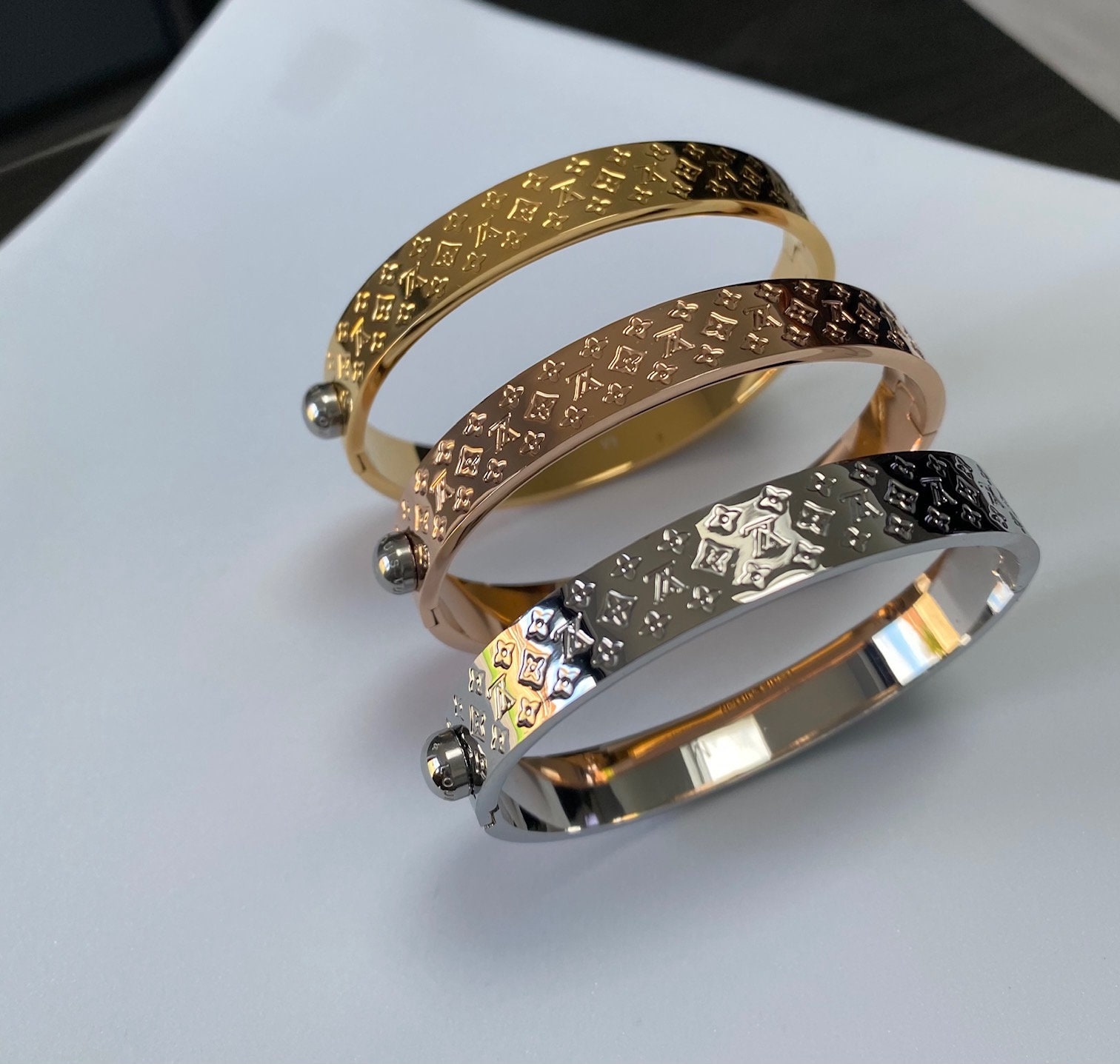 LOUIS VUITTON Rose Gold Nanogram Cuff Gorgeous and chic. Bold with the  classic N