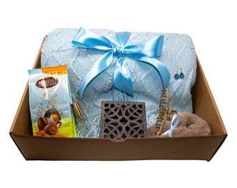 Caja de regalo con diseño de manta acogedora y tema azul