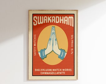 Puede incluir: Una etiqueta de caja de cerillas de estilo vintage con el texto "SWAKADHAM" en una fuente naranja en negrita. La etiqueta presenta un círculo amarillo con una ilustración azul de dos manos en posición de oración. El texto "SAFETY MATCHES" está en el lado izquierdo de la etiqueta, y "50'S PRICE 15 PS" está en el lado derecho. La parte inferior de la etiqueta dice "SHELVALUXMI MATCH WORKS CHINNAGOLLAPATTI".