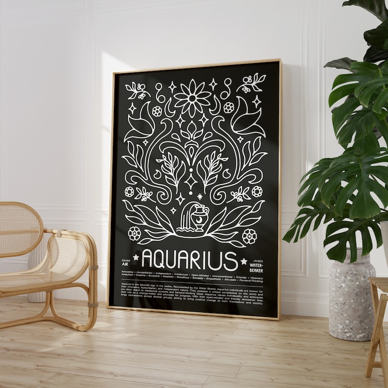 May include: Black and white illustration of the zodiac sign Aquarius with a floral design. The text "Aquarius" is in white with stars on either side. The text below describes the sign's characteristics, including "Humanitarian, Independent, Intellectual, Original, Unconventional, Friendly, Visionary, Curious, Rebellious, Sociable, Bizarre, Unique, Progressive, Forward Thinking".