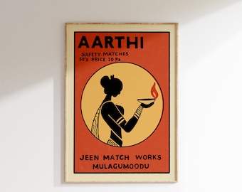 Puede incluir: Una etiqueta de caja de cerillas vintage con fondo naranja y un círculo amarillo que presenta una silueta negra de una mujer sosteniendo una lámpara encendida. El texto dice "AARTHI SAFETY MATCHES 50's PRICE 20 Ps JEEN MATCH WORKS MULAGUMOODU".