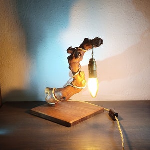 Handmade table lamp, rustic decoration. Branch lamp collected and made by hand. Decorative and recycled wood. Vine wood.