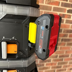 May include: A black and red Bosch 18V 4.0 Ah battery pack attached to a black and gray tool storage system. The battery pack is labeled with the Bosch and AMP Share logos. A yellow adapter is also visible.