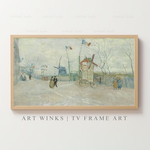 May include: Framed print of a painting depicting a street scene with windmills, figures, and flags. The artwork is in a muted color palette with a light wooden frame. Text at the bottom reads "ART WINKS | TV FRAME ART."