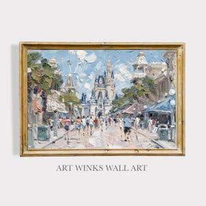 May include: Oil painting of a bustling street scene with a castle in the background. The artwork features a gold frame and the text "ART WINKS WALL ART" at the bottom. The painting uses a palette of blues, greens, and beige.