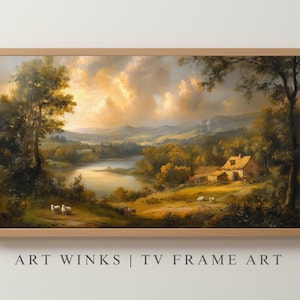 Op de afbeelding: Een ingelijst landschapsschilderij toont een serene landelijke scène met een rivier, bomen en een boerderij. Het kunstwerk heeft warme tinten geel, bruin en groen, met schapen die in een veld grazen. De tekst "ART WINKS | TV FRAME ART" staat onderaan.