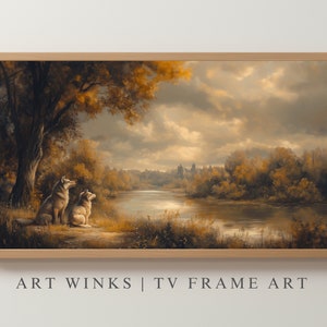 May include: A painting of two wolves sitting by a river in a forest. The sky is cloudy and the trees are a muted yellow and green. The river is calm and reflective.