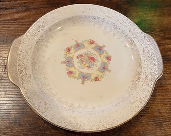 Antiker Porzellanteller mit handgemaltem Blumenmuster und Details aus 22K Gold