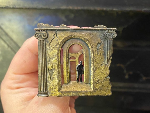 Signed JJ 1988 Brutalist Brass Brooch—Man in Ancient Ruins