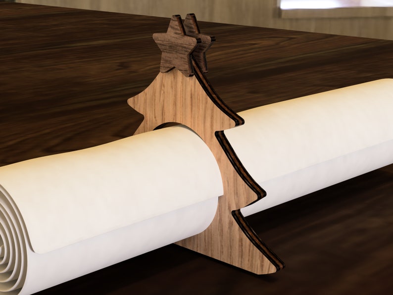 May include: Wooden Christmas tree-shaped paper towel holder with a star on top. The holder is holding a roll of white paper towels.