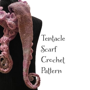 May include: A crocheted tentacle scarf in shades of pink, purple, and gray, displayed on a black mannequin. The scarf features a textured design with rounded details and the text "Tentacle Scarf Crochet Pattern".