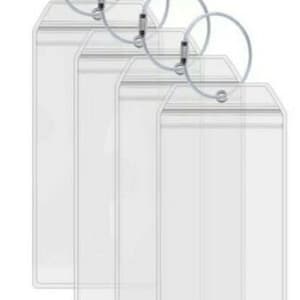 May include: Four clear plastic badge holders with metal rings attached. The holders are designed to hold ID cards or other documents.