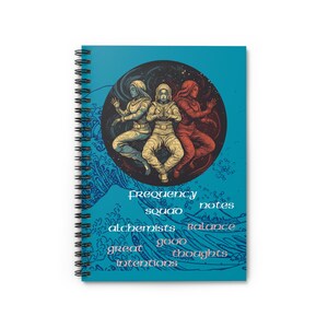 May include: A blue spiral notebook with a colorful illustration of three figures in a circle. The text "Frequency Squad Notes" is at the bottom of the illustration. Below the text are the words "Alchemists, Balance, Good, Great Intentions, Thoughts".