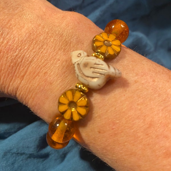 Amber bird and flower stretch bracelet