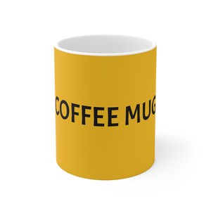 May include: A yellow coffee mug with black text that reads "COFFEE MUG".
