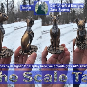 May include: Bronze-colored Bastet cat figurines in various poses. Each cat statue has intricate details and sits on a decorative base. The image includes text: "Dark Artefact Designs Zane Rogers" and "The Scale Tales".