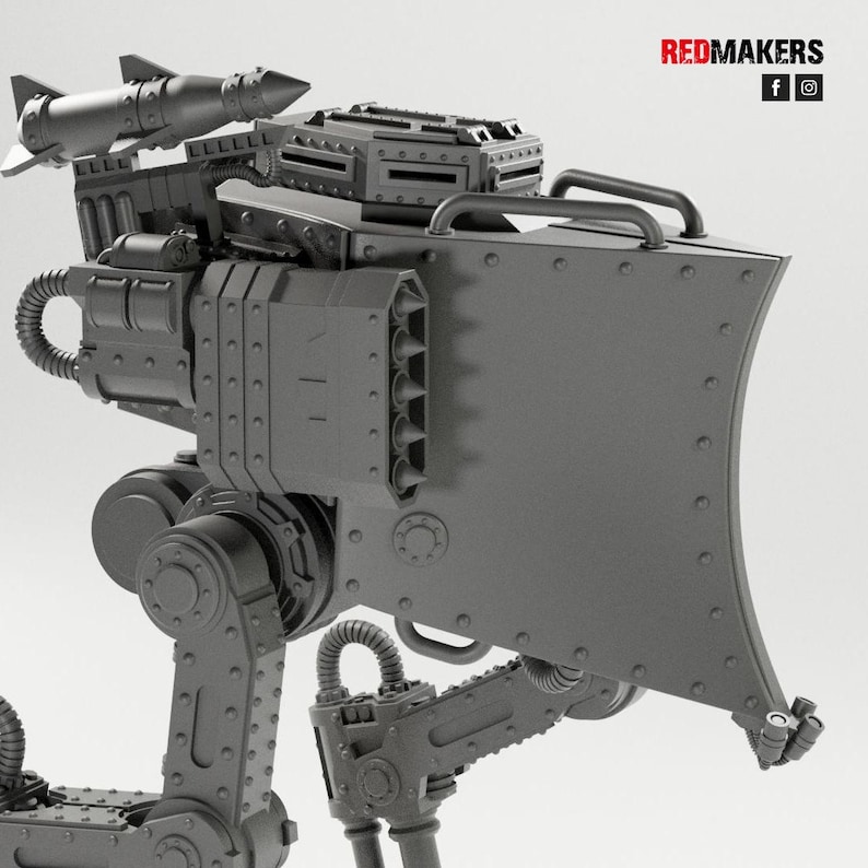 May include: A detailed, gray model of a mechanical war machine, featuring a missile launcher, a large shield, and articulated legs. The design includes rivets, vents, and a handle. The text "REDMAKERS" is visible.