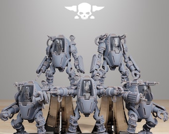 May include: Several gray miniature mech models are displayed, each with a cockpit and articulated limbs. The models are on black circular bases. The text "STATIONFORGE" and a skull logo are at the top.