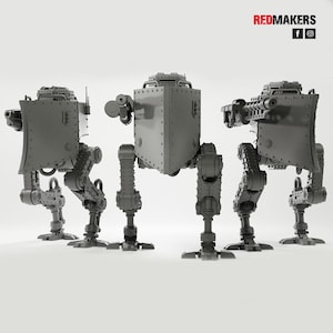 May include: Three gray, mechanical war machines with box-like bodies, articulated legs, and weapon attachments. The machines have a futuristic, industrial design, with rivets and detailed components. The Redmakers logo is visible in the top right corner.
