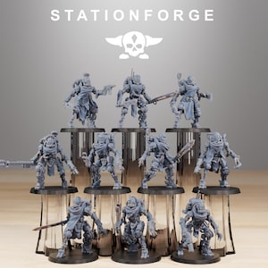 May include: A set of ten gray plastic miniature figures of robots with weapons. The figures are posed in various action stances. The figures are on a wooden surface. The figures are from the company Stationforge.