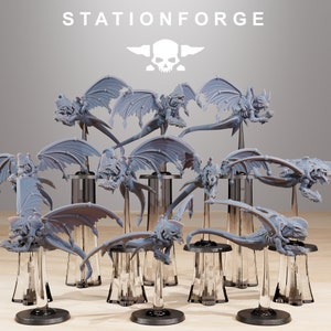 May include: A collection of 10 gray, detailed miniature dragon figurines with wings, standing on clear plastic bases. The dragons are posed in various positions with their wings spread out. The figurines are all facing forward and are arranged in a semi-circle.