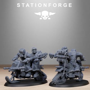 May include: Two gray miniature figures on snowmobiles. The figures are wearing winter gear and carrying weapons. The snowmobiles have skis and tracks. The text "STATIONFORGE" is at the top of the image.