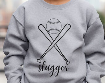 Slugger, baseball e mazze. T-shirt in cotone per bambini, T-shirt in cotone per bambini o maglione girocollo. Unisex. Regalo per lui o per lei. Amanti dello sport. Bambini