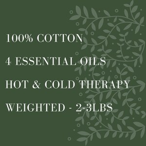 May include: Dark green background with white text: "100% Cotton, 4 Essential Oils, Hot & Cold Therapy, Weighted - 2-3LBS." Decorative gray leaf design in the upper right corner.