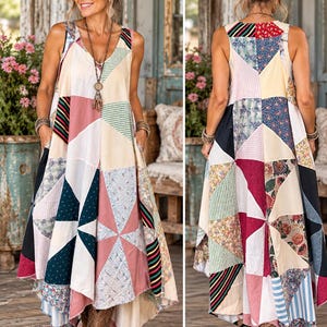 May include: A sleeveless midi dress featuring a patchwork design composed of various triangular fabric panels in shades of pink, cream, blue, and black, with floral, striped, and solid patterns, a V-neckline, and side pockets in a loose, flowing silhouette.