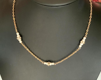 Vintage gold tone 16" station necklace with faux pearls and rhinestone rondelles