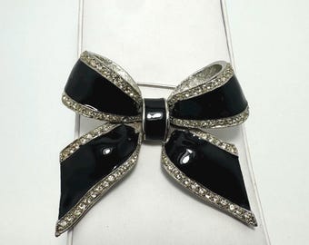 Vintage, silvertone and black enamel bow brooch with clear crystals. Unmarked